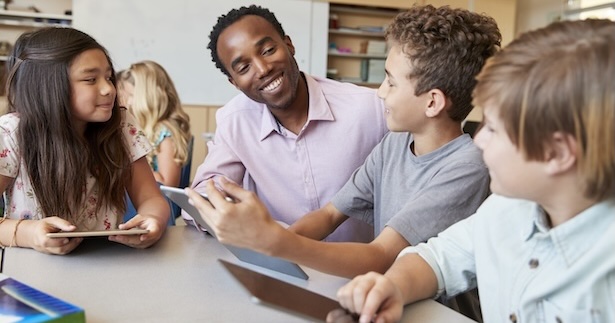 Teacher and students are engaged in discussion