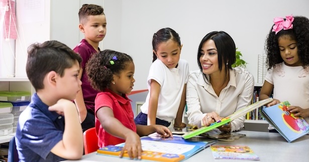 Teacher teaching a group of students